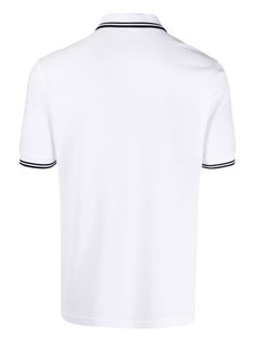 Twin Tipped polo shirt from FRED PERRY featuring white, BCI cotton, embroidered logo at the chest, striped tipping, polo collar, short sleeves and straight hem. Conscious: This item contains cotton from a brand that is committed to improving farming practices globally through the Better Cotton Initiative (BCI).. | Fred Perry Twin Tipped polo shirt Cotton Polo T-shirt With Contrast Collar, Classic Cotton T-shirt With Striped Collar, Classic Polo T-shirt With Striped Collar, Classic White Collared Polo Shirt, Classic White T-shirt With Ribbed Collar, Cotton Shirt With Contrast Collar, Short Sleeve, Cotton Shirt With Contrast Collar And Short Sleeves, Classic Top With Embroidered Logo And Collared Neckline, Cotton Tops With Embroidered Logo And Collared Neckline