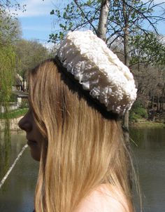 "This is a wonderful and unique hat! The label shows it is from \"filbert orcel BOUTIQUE, Paris\". This is woven ivory white colored plastic, with a straw appearance. The border is a light brown satin. This hat measures 8\" across. The height at the highest point is 3 & 3/4\". This is in excellent condition, I see no issues. Fantastic!" Vintage White Hat With High Crown, Vintage White High Crown Hat, Vintage White Costume Hat With Short Brim, Cream Hat For Church, Cream Hat Headpiece For Church, Cream Short Brim Headpiece For Church, Vintage White Brimmed Mini Hat, Vintage Cream Costume Hat With Curved Brim, Cream Brimmed Bonnet One Size Fits Most