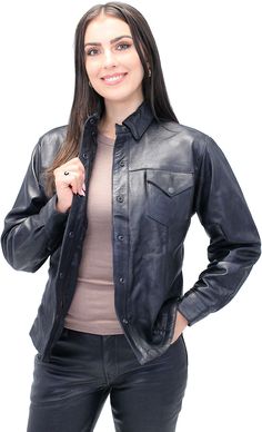 Leather shirt for women also available in plus sizes. A black leather women's shirt that is great looking, tailor fitting, lightweight and ideal for riding. This women's leather shirt is exclusive Jamin Leather® and modeled after a classic jean style shirt. Made of soft buffalo leather that snaps up front, has two snap down chest pockets, two inside chest pockets, two hidden front pockets in the seams, snap cuffs, snap down collar to keep from flapping and has a soft nylon lining. This leather shirt for women is a bit longer and helps keep the draft out while riding. Made with extra durable long lasting buffalo leather. Sizes may run small. Sizes: XS, S, M, L, XL, 2X, 3X, 4X, 5X. +$10 for 2X-3X, +$20 for 4X-5X. [3#] soft nylon lining two hidden front pockets two inside chest pockets two ch Black Leather Button-up Top, Fitted Classic Leather Tops, Classic Fitted Leather Tops, Fitted Classic Leather Top, Button-up Leather Jacket, Classic Leather Tops For Fall, Ladies Shirt, Leather Travel Bag, Leather Skin