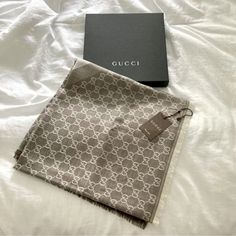 Beautiful Gucci Scarf That Is A Gray Taupe And Light Beige Color With Gg Motif All Over. 80% Wool And 20% Silk. New With Unattached Tag And Box. Perfect Gift!! Size 55.1”W X 55.1”L (140cm X 140cm) Made In Italy Gucci Shawl, Gucci Silk Scarf, Beige Scarf, Designer Scarf, Gucci Scarf, Branded Scarves, Aesthetic Fits, Grey Scarf, Closet Organizer