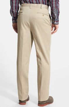 A classic flat front details sharp, office-ready trousers fashioned from soft, wrinkle-resistant cotton. 32" inseam; 19" leg opening; 12" front rise; 18" back rise (size 33/32) Zip fly with hook-and-eye closure Side-seam pockets; back button-welt pockets 100% cotton Machine wash, tumble dry Imported Men's Clothing Fitted Cotton Chinos For Semi-formal Occasions, Chino Cotton Twill Straight Leg Dress Pants For Work, Straight Leg Chino Cotton Twill Dress Pants For Work, Fitted Chino Cotton Twill Pants For Workwear, Chino Cotton Twill Dress Pants With Pockets For Work, Cotton Tapered Leg Dress Pants For Work, Cotton Dress Pants With Tapered Leg For Work, Relaxed Fit Dress Pants For Business Casual, Relaxed Fit Full Length Dress Pants For Business Casual