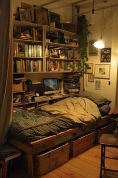 Cozy loft bedroom with a computer desk, bookshelves, and plants, warmly lit by a hanging light. Lively Room Ideas, Save Room Aesthetic, Storage For Rooms, Cool Diy Things For Your Room, Cool Room Layouts, Room Decoration Inspiration, Styling Your Bedroom, Room Vintage Decoration, Room Inspiration Bookshelf