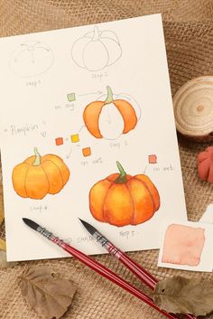 the pumpkins are being drawn on paper