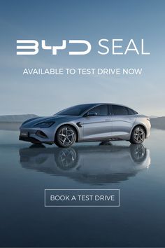 the front end of a silver car with text that reads, b4d seal available to test drive now