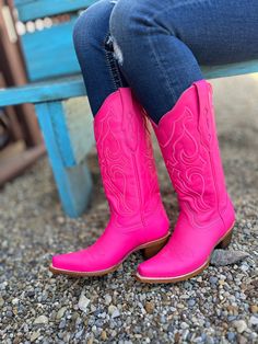 Astonishing, gorgeous, and fashionable. A style that will last for years to come, these hot pink boots are what you need.The hot pink shaft is highlighted with an embroidery pattern on its 13-inch height. Wear them with jeans or a dress, and give your outfit that pop of color you were looking for.This is a style you can wear all day without worrying about getting tired. It features; sturdy pull-on straps with an elegant snip-toe silhouette The smooth inside leather lining, cushioned leather inso Hot Pink Boots, Snip Toe Cowgirl Boots, Western Riding Boots, Hot Pink Outfit, Work Shoes Women, Wedding Boots, Corral Boots, Western Store, Youth Shoes