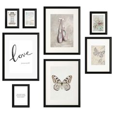 several framed pictures are hanging on the wall with different designs and words above them that say love