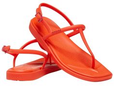 Crocs Miami Thong Sandal - Women's Sandals : Lava : Style these versatile, elegant and summery Crocs Miami Thong Sandal for a relaxing walk on the beach. These square toe lightweight flats are incredibly light and easy to wear with stylish asymmetrical straps made of soft, flexible TPU material. The Croslite Foam offers an iconic crocs comfort that is perfect for relaxing at the beach or walking around town. Made from TPU upper, EVA footbed and outsole. What Size Should I Buy?: These Shoes Offer A Relaxed Fit And We Recommend Ordering A Size Down To The Next Largest Whole Size. (i.e. If you are a size 7.5, order a size). Shop With Confidence: Crocs products are backed by our 90-day manufacturer's warranty for high quality and authenticity. Terms and conditions apply. Imported. Summer T-strap Flip Flops For Vacation, Summer Beach T-strap Flip Flops, Adjustable T-strap Flip Flops For Summer, Adjustable T-strap Sandals For Beach Season, Adjustable T-strap Summer Flip Flops, Adjustable T-strap Flip Flops For Beach Season, Walk On The Beach, Women's Crocs, Beach Walk