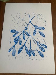 a blue ink drawing of an olive tree branch