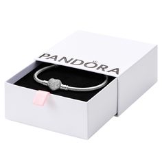 PRICES MAY VARY. Snake Chain Heart Bracelet: Set your heart a-flutter with this romantic PANDORA charm bracelet; pair it with other PANDORA bracelets for a multi-layered look Compatible with PANDORA Moments: PANDORA Moments is a way to say something about who you are through every charm and bracelet you choose and how you choose to wear it Features CZ: Cubic zirconia could be said to be the jewel in PANDORA's crown, making up the majority of stones we use in our jewelry because it optically look Crown Making, Pandora Collection, Real Christmas, Chain Heart, Snake Chain Bracelets, Gold Charm Bracelet, Pandora Charm, Broken Chain, Pandora Bracelets