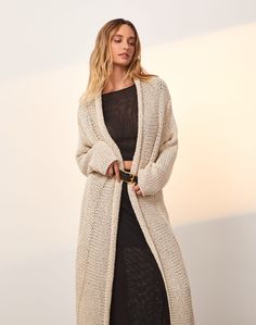 The ViX Knit Midi Long Cardigan is a timeless and lightweight piece that will keep you warm when the breeze carries a subtle chill. It features an open front for easy wear all day long.  Style the Knit Midi Long Cardigan with your favorite set and accessorize with jewelry and sandals for a cozy, put-together ensemble.Features: Knit long cardigan;  Open front;  Long sleeves; Style# 295-859-003 Open Knit Sweater For Daywear In Fall, Open Knit Sweater For Fall Daywear, Cozy Long Outerwear For Daywear, Open Knit Long Sleeve Cardigan For Daywear, Long Sleeve Open Knit Cardigan For Daywear, Cozy Open Front Outerwear For Daywear, Open Knit Cardigan For Fall Daywear, Fall Open Knit Cardigan For Daywear, Fall Open Knit Cardigan