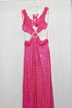 Elevate your style with our Fuchsia Sequin Maxi Dress with Pearl Trim. This enchanting dress is perfect for making a statement at special events, whether it's a glamorous party, a chic wedding guest appearance, or any elegant occasion. The exquisite sequin detailing and pearl trim add a touch of sophistication to your look. Crafted from 100% polyester, this dress offers both comfort and style. The lace-up design ensures a perfect fit, highlighting your silhouette beautifully. Embrace luxury and Enchanting Dress, Fuchsia Dress, Glamorous Party, Pearl Dress, Sequin Maxi Dress, Sequin Maxi, Fuchsia Color, Chic Wedding, Dress Materials