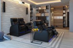 a living room filled with black leather chairs