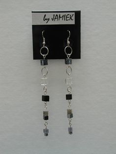 Earrings Ring and Block Chain with Black and Clear by rrdesigns561 Elegant Silver Beaded Chain Earrings, Silver Earrings With Beaded Chain, Minimalist Silver Jewelry With Dangling Beads, Adjustable Silver Beaded Chain Earrings, Adjustable Silver Beaded Earrings With Beaded Chain, Metal Drop Earrings With Beaded Chain, Metal Beaded Chain Dangle Earrings, Silver Beaded Chain Earrings For Gift, Silver Earrings With Beaded Chain For Party