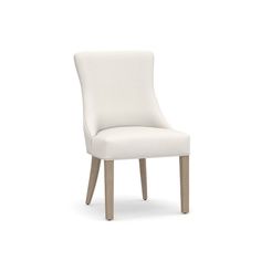 a white upholstered chair with wooden legs