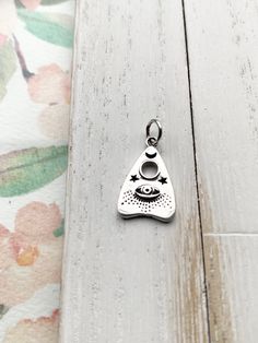 This listing is for (1) Ouija Charm with Evil Eye and Design Pendant 20x11mm including closed bail. sterling silver Evil Eye, Sterling Silver, Pendant, Silver, Design