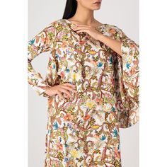 Kaftan with one fitted sleeves printed in paisley, made in cotton silk. Fabric is soft, light & flowy. Maxi in length. Fabric is cotton silk, flowy & soft  Dry clean preferred Do not wring Do not bleach Hand dry Silk Floral Print Patterned Kaftan, Floor-length Floral Silk Kaftan, Silk Floral Print Floor-length Kaftan, Cotton Silk Fabric, Cropped Linen Pants, Fitted Sleeves, Silk Kaftan, Printed Silk, Linen Top