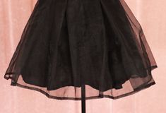 Cute black tutu style skirt Best Fit:AU8-AU10 Measurements in CENTIMETRES with the garment lying flat:  Length :47 Waist :29-39 Hips :up to 68 StretchElastic waist ** MEASUREMENTS ARE BEST COMPARED AGAINST A SIMILAR ITEM OF CLOTHING ** Measurements are taken along one side of garment lying flat (double for all the way round measurements). 'Best fit' is an approximation in AUSTRALIAN SIZING; be sure to check over measurements carefully All our items are measured in CENTIMETRES with the measurements clearly stated in the description, As most items are handmade sizes can slightly differ so please carefully check the measurements before ordering as we do not refund size issues. Black Full Mini Skirt For Party, Black Tulle Mini Skirt For Spring, Fitted Black Tulle Mini Skirt, Black Fitted Tulle Mini Skirt, Black Full Mini Skirt For Evening, Tutu Style, Style Mini Skirt, Black Tutu, Style Skirt