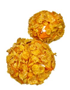 two pieces of cornflakes sitting on top of each other