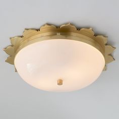 a close up of a light fixture on a ceiling