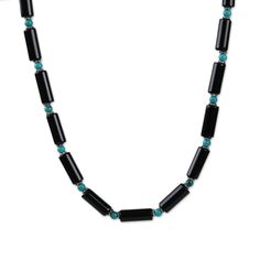 This necklace is made using beautiful turquoise and onyx beads creating a stunning affect. Adding diminutive beads of sterling silver, Somluck Komolmith creates a beautiful choker that adjusts in length. Onyx Reconstituted Turquoise Sterling Silver Spring ring clasp 16.5 Inches Adjustable Length Handmade in & fairly traded from Thailand Adjustable Black Beaded Turquoise Necklace, Adjustable Hand-strung Onyx Necklace, Paw Print Jewelry, Beautiful Chokers, Ribbon Jewelry, Printed Jewelry, Flip Flop Shoes, Onyx Bead, Silver Spring