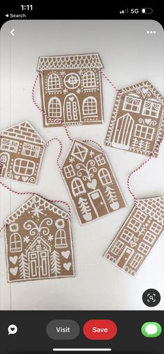 gingerbread cutouts are hanging on a string