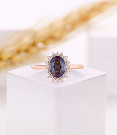 an oval shaped blue sapphire and diamond ring