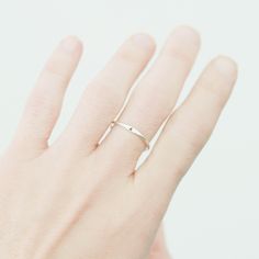 The Wave Initial Ring Our slim 1.3 mm band is hand formed, soldered, hammered and stamped with your tiny initial or monogram (up to 3 characters). Wear one, or stack them for all your loves. ♥ This listing is for one ring; add multiple quantities to your cart for more. {DETAILS}: * 1.3 mm band (2 mm where initial sits) * 1.5 mm initial * your choice of sterling silver, 14k gold fill, rose gold fill or solid 14k gold! ►Lots more stacking rings for...stacking! http://etsy.me/1U0RlXp ►Silver heart Personalized Initial Ring, Sterling Silver Stacking Rings, Letter Ring, Stacking Bands, Personalized Ring, Initial Ring, Minimalist Ring, Personalized Rings, Personalized Initials