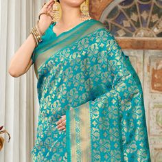 Turquoise colored saree is made from banarasi silk fabric which is highlighted with beautiful floral weaving work as shown. comes along unstitched banarasi silk blouse piece which you can customise as per your design/style. Occasion - You can buy this saree for festive and functions. Note:- The actual product may differ slightly in color and design from the one illustrated in the images when compared with computer or mobile screen. Measurements: Saree : Banarasi Silk : 5.5 Mtrs Blouse : Banarasi Floral Weaving, Saree Banarasi, Banarasi Silk Saree, Mobile Screen, Turquoise Color, Blouse Piece, Surprise Gifts, Design Style, Silk Blouse