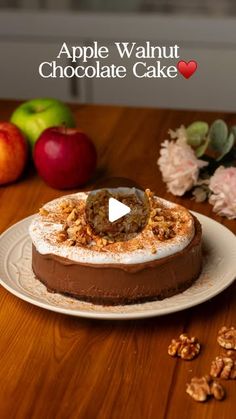 an apple walnut chocolate cake on a white plate