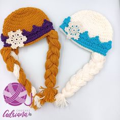 two crocheted hats with braids on them