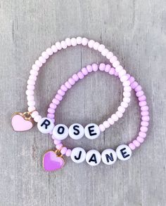 Girls Name Bracelets - Candy Colored The sweetest name bracelet for your little girl. And makes a great gift or baby shower gift ✨ Candy colored 3mm seed beads with personalized name and heart charm Color options available* CARING TIPS FOR YOUR JEWELRY ⭐️Treat and store with care. ⭐️ For longevity, avoid exposing your jewelry to water. ⭐️ Avoid having direct contact with lotions, perfumes, sanitizers as these chemicals may cause discoloration of your jewelry. Adjustable Heart Bracelet With Round Beads For Birthday, Adjustable Beaded Heart Bracelet For Birthday, Cute Beaded Bracelets For Personalized Gifts, Cute Heart Beads Beaded Bracelets For Valentine's Day, Adjustable Heart Beaded Bracelets For Birthday, Gift Beaded Bracelets With Letter Beads, Cute Heart Beaded Bracelets For Valentine's Day, Adjustable Beaded Bracelets With Heart Beads For Birthday, Cute Personalized Friendship Bracelets With Round Beads