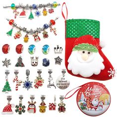 a christmas stocking with lots of charms on it and a small bag next to it