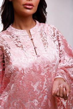 Elevate your celebration look in pure elegance. the Angelika pink floral. caftan dress features exquisite floral embroidered lace that wraps you in timeless beauty, while the delicate sheen of the fabric catches the light as you move. The playful bell sleeves add a touch of whimsical fun. Whether you’re making memories at a family celebration or standing out at an upscale party, this caftan ensures you feel both stunning and effortlessly elegant, celebrating every moment in chic sophistication.F Pink Embroidered Long Sleeve Kaftan, Designer Pink Floral Embroidered Kaftan, Embroidered Pink Floor-length Kaftan, Spring Long-sleeve Kaftan With Intricate Embroidery, Elegant Floral Embroidered V-neck Kaftan, Black Tie Gala, Curvy Plus Size, Caftan Dress, Formal Gowns