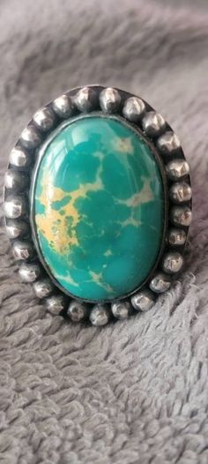 Here is a 100% hand made silver  Broken arrow green blue turquoise with a beautiful golden matrix thisstone is solid and not backed or color enhanced  it is all natural. This stone was cut in house and the ring was made in house all by hand currently it is a size 9 3/4 us , please specify size when ordering I can resize at no additional charge. Miriam Haskell Jewelry, Broken Arrow, Rachel Green, Green Turquoise, Turquoise Blue, Turquoise Ring, Rings Statement, Blue Green, Statement Rings