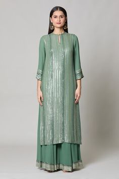 Forest green straight kurta with linear pattern sequin embroidery. Comes with embroidered hem palazzo and striped sequin sheeted dupatta. - Aza Fashions Green Sequined Straight Kurta, Festive Green Sequined Kurta, Kurta Palazzo Set, Embroidered Hem, Women Kurta, Palazzo Set, Sequin Embroidery, Linear Pattern, Straight Kurta