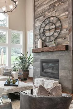 a living room filled with furniture and a large clock mounted to the wall above it