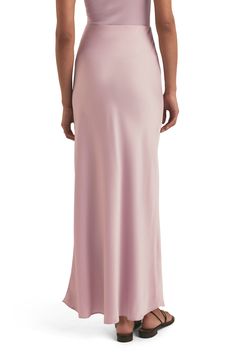 This curve-hugging maxi skirt is a sleek and modern addition to your everyday wardrobe. 39" center front length (size Medium) Lined 100% polyester Dry clean or machine wash, line dry Imported Feminine Long Maxi Skirt For Evening, Feminine Evening Long Maxi Skirt, Feminine Relaxed Maxi Skirt For Evening, Feminine Relaxed Fit Maxi Skirt For Formal Occasions, Feminine Formal Relaxed Maxi Skirt, Feminine Evening Maxi Skirt, Feminine Evening Maxi Skirt With Lining, Chic Full Length Bias Cut Maxi Skirt, Feminine Silk Maxi Skirt