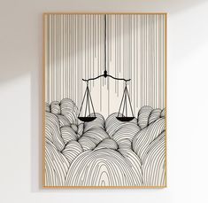 a drawing of two scales on top of each other in front of a white wall