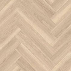 an image of wood flooring that looks like chevrons