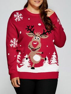 a woman wearing a reindeer sweater with snowflakes on it