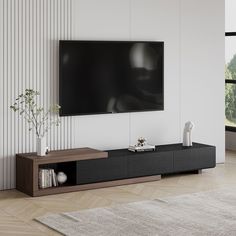 a living room with a large flat screen tv mounted on the side of it's wall