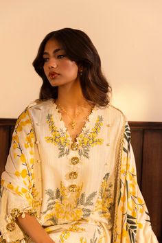 Brand: Sana SafinazProduct Code: M243-007B-3CPCollection: Muzlin by Sana Safinaz Unstitched Winter CollectionFabric: Slub DESIGN DETAILS: Embroidered Front Kali On Slub 3 Pieces Dyed Back On Slub 1.20 Meters Embroidered Sleeves On Slub 0.65 Meters Embroidered Kuful For Sleeves On Organza. 2 Pieces Digital Printed Shawl 2.5 Meters Dyed Cotton Pants 1.75 Meters DISCLAIMER:* Lining, Laces, and Tassels are not included in unstitched variants.* Embellishment items in stitched outfits are subject to market availability.* Product color may vary due to photographic lighting or your device settings. CARE INSTRUCTIONS: Extra Fabric Has Been Used For Shoot Original Color May Vary Slightly From The Picture Dry Clean Recommended Iron The Clothes At Moderate Temperature Do Not Use Bleach, Or Stain Remov Chanderi Palazzo Set With Resham Embroidery And Long Sleeves, Semi-stitched Yellow Palazzo Set With Floral Embroidery, Designer Wear Floral Embroidered Anarkali Set, Traditional V-neck Set With Resham Embroidery, Unstitched Embroidered Sharara, V-neck Salwar Kameez With Resham Embroidery For Eid, Elegant Sets With Resham Embroidery And V-neck, Diwali Dabka Work V-neck Sets, Spring V-neck Sets With Resham Embroidery