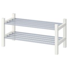 a white shelf with two shelves on each side