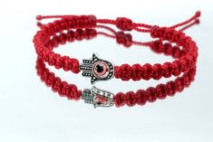 Very cute and durable hand-made kids size red string Hamsa Hand bracelet with an evil eye for wrist sizes 4 1/2 to 7 in, and an easy to use zip like function to fit your kids wrist. Made from high quality red string, it will be sure to last.  The Hamsa Hand is an ancient Middle Eastern amulet symbolizing the Hand of God. In all faiths it is a protective sign. It brings its owner happiness, luck, health, and good fortune.  Each bracelet is carefully handcrafted and give proper time to ensure qual The Hand Of God, Red String, Hand Bracelet, Hamsa Hand, Braided Bracelets, Middle Eastern, Evil Eye, Good Luck, Rope Bracelet