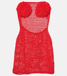 a red dress with flowers on the front and back, made out of crochet