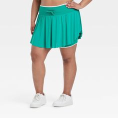 Why we're ALL IN: Solid-color seamless skort with soft gathers and wrap-style accents on the sides. Boasts a midweight nylon and spandex construction with four-way stretch as well as moisture-wicking properties to help keep you cool and comfy during any activity. The wide waistband with drawcord, built-in brief, mini length and mid-rise waist complete the sporty design. All in Motion™: Inspiring the potential in every body. Lightweight Moisture-wicking Activewear For Spring, Sporty Spring Activewear With Wide Waistband, Sporty Activewear With Wide Waistband For Spring, Light Sporty Bottoms For Spring, Casual Elastic Nylon Activewear, Sporty Spring Activewear With Elastic Fit, Sporty Elastic Activewear For Spring, Functional Seamless Summer Bottoms, Green Stretch Lightweight Bottoms