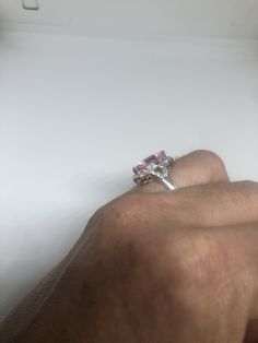 Vintage white and pink CZ ring 925 Sterling Silver Setting Size 7 Can be resized, my jeweler charges $10-$20 All rings are shipped free in the US in a nice gift box. Check out our over a THOUSAND great reviews Engraving is $4 per letter and is not always perfect depending on the piece. It can take a few days if the jeweler is busy. This is payable to Paypal Judithsltd@gmail.com Elegant Pink Sterling Silver Diamond Ring, Stamped 925 Rings For Mother's Day Wedding, Formal Pink Sterling Silver Diamond Ring, Silver Pear-shaped Jewelry For Valentine's Day, Elegant Pink Sterling Silver Rings, Pear-shaped Silver Jewelry For Valentine's Day, Silver Ring For Formal Occasions And Mother's Day, Silver Ring For Formal Occasions On Mother's Day, Pink Sterling Silver Diamond Ring With Accent Stones