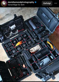 an open case filled with electronic equipment on the ground