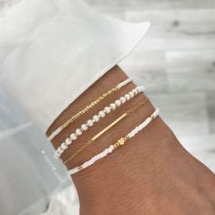 Bracelet Set 'Metallic Black & Brown' – Mint15 Basic Bracelets, Ušný Piercing, White And Gold Bracelet, Stretch Beaded Bracelets Diy, Timeless Bracelet, Popular Bracelets, Preppy Jewelry, White Pearl Bracelet, Bracelet Sets