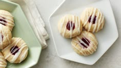 some cookies are sitting on a plate next to a bowl